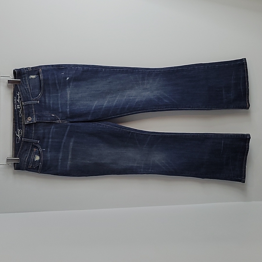 Levi's distressed demi curve Low Rise boot cut jeans size 27 x 30